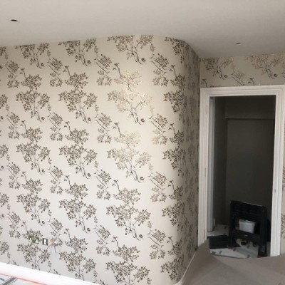 Installing Juliet Travers wallpaper in Parsons Green, London